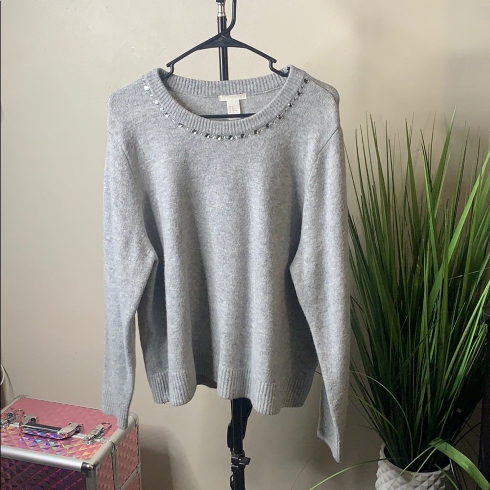 Grey sweater.